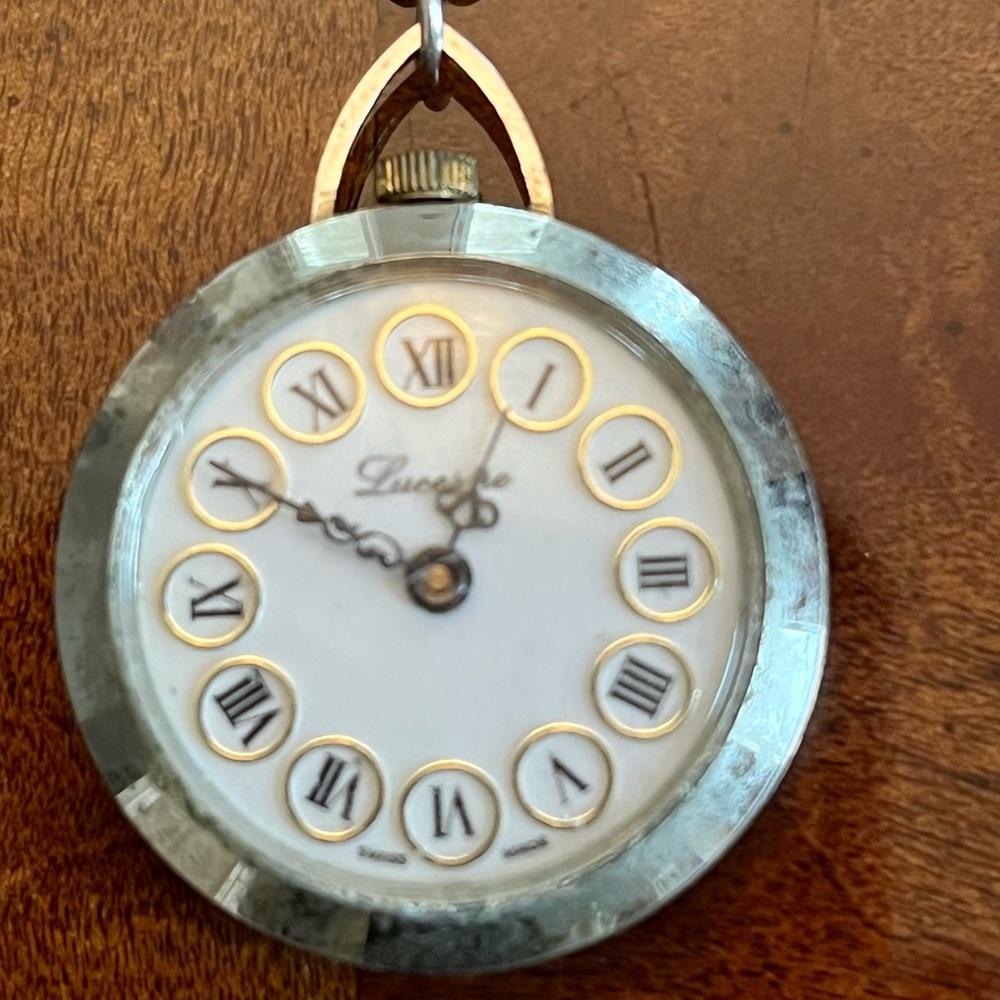 Vintage Lucerne pocket watch on 20 inch chain.